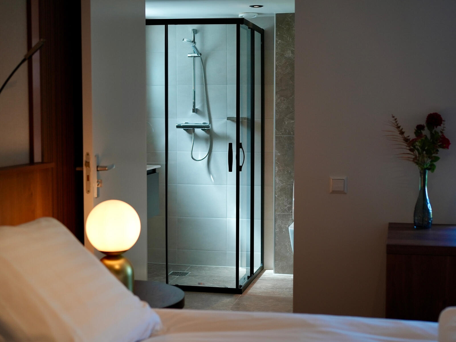 Bed and bathroom